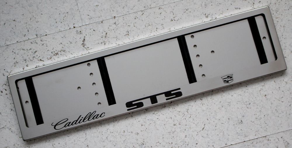 Номерная рамка Кадиллак СТС из нержавеющей стали с логотипом