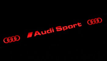 Номерная рамка AUDI Sport из нержавеющей стали со светящейся надписью